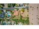 Expansive property featuring lush landscaping, pool, basketball court, horse property and detached structure at 1637 S Los Alamos Cir, Mesa, AZ 85204