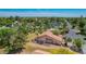 Expansive property showcasing a desert-landscaped yard and a charming single-story house with a terracotta roof at 1637 S Los Alamos Cir, Mesa, AZ 85204