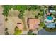 Expansive property featuring lush landscaping, pool, basketball court, horse property and detached structure at 1637 S Los Alamos Cir, Mesa, AZ 85204