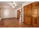 Bedroom with hardwood floors and closet at 1637 S Los Alamos Cir, Mesa, AZ 85204