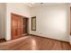 Bedroom with hardwood floors and large closet at 1637 S Los Alamos Cir, Mesa, AZ 85204