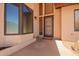 Close-up on the home's front door and windows at 1637 S Los Alamos Cir, Mesa, AZ 85204