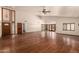 Open-concept living room features hardwood floors, high ceilings, windows and abundant natural light at 1637 S Los Alamos Cir, Mesa, AZ 85204
