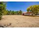 Spacious lot with lush landscaping, outbuildings and perimeter horse fencing at 1637 S Los Alamos Cir, Mesa, AZ 85204