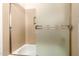 Shower with sliding glass door at 1637 S Los Alamos Cir, Mesa, AZ 85204