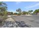 Gated entrance to the community, enhancing security and privacy, with lush landscaping at 16600 N Thompson Peak Pkwy # 2050, Scottsdale, AZ 85260