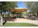 Shaded playground with play structures and picnic area, perfect for outdoor fun and Gathering gatherings at 16600 N Thompson Peak Pkwy # 2050, Scottsdale, AZ 85260