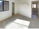 Bright bedroom with a large window and closet at 16753 N 157Th Ave, Surprise, AZ 85374