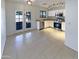 Bright and airy kitchen featuring stainless steel appliances and a seamless transition to the outdoor patio at 16753 N 157Th Ave, Surprise, AZ 85374