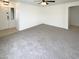 Inviting living room with neutral carpet and a front door at 16753 N 157Th Ave, Surprise, AZ 85374