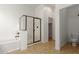Bathroom featuring a separate shower, a soaking tub, and tile flooring at 18033 W Tecoma Rd, Goodyear, AZ 85338