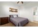 Bedroom featuring neutral colors, a ceiling fan, and carpeted floors at 18033 W Tecoma Rd, Goodyear, AZ 85338