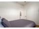 A bedroom features neutral walls and a comfortable bed at 18033 W Tecoma Rd, Goodyear, AZ 85338