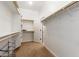 Walk in closet with built-in shelving at 18033 W Tecoma Rd, Goodyear, AZ 85338