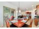 Open-concept dining room adjacent to the kitchen offers a welcoming space for meals and gatherings at 18033 W Tecoma Rd, Goodyear, AZ 85338