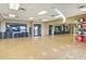Well-equipped gym with exercise equipment, mirrored walls, and ample space for fitness activities at 18123 W Hiddenview Dr, Goodyear, AZ 85338