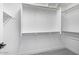 Spacious walk-in closet with ample shelving and storage space for organizing belongings at 18123 W Hiddenview Dr, Goodyear, AZ 85338