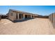 Spacious backyard with room for customization and outdoor living, featuring potential for landscaping at 18150 W Tanglewood Dr, Goodyear, AZ 85338