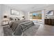 Bedroom with sliding glass doors and neutral decor at 18150 W Tanglewood Dr, Goodyear, AZ 85338