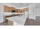Well-lit kitchen featuring light countertops and modern cabinetry at 18150 W Tanglewood Dr, Goodyear, AZ 85338