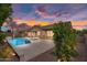 Relaxing backyard featuring a pool, spa, and a covered patio, perfect for entertaining at 22296 E Maya Rd, Queen Creek, AZ 85142