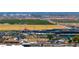 Arial view features houses and commerical building with a park nearby at 22302 E Russet Rd, Queen Creek, AZ 85142