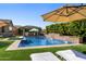 Resort-style pool, cabana, and outdoor kitchen perfect for entertaining and relaxation at 22302 E Russet Rd, Queen Creek, AZ 85142