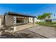 Expansive backyard with a covered patio and well-maintained landscaping at 2236 W Shaw Butte Dr, Phoenix, AZ 85029