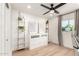 Bright bedroom with stylish decor, including modern artwork and a ceiling fan at 2236 W Shaw Butte Dr, Phoenix, AZ 85029