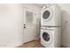 Convenient laundry area with a stacked washer and dryer, maximizing space at 2236 W Shaw Butte Dr, Phoenix, AZ 85029