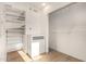 Spacious walk-in closet with custom shelving and built-in drawers, offering ample storage at 2236 W Shaw Butte Dr, Phoenix, AZ 85029