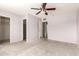 Bedroom with neutral carpet, ceiling fan and closet at 225 N Standage -- # 30, Mesa, AZ 85201