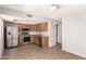 Well-equipped kitchen featuring modern stainless steel appliances and ample cabinet space at 225 N Standage -- # 30, Mesa, AZ 85201