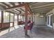 Spacious covered patio with tile flooring, ceiling fan, and comfortable seating, great for relaxing at 232 W San Angelo St, Gilbert, AZ 85233