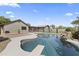 Backyard featuring a refreshing pool, diving board, charming patio, and fenced yard at 232 W San Angelo St, Gilbert, AZ 85233