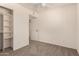 Bedroom featuring carpet flooring, a ceiling fan, and a closet with shelving at 234 S Neely St, Gilbert, AZ 85233
