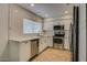 Modern kitchen features stainless steel appliances, white subway tile backsplash, and ample countertop space at 234 S Neely St, Gilbert, AZ 85233