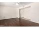 Spacious living room with modern ceiling fan, neutral walls, and new laminate flooring for a welcoming space at 234 S Neely St, Gilbert, AZ 85233