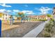 Community playground with swings, slides, and climbing structures provides a fun space at 2491 N 149Th Ln, Goodyear, AZ 85395