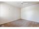 This bedroom boasts neutral walls and carpeting, and a ceiling fan at 29606 N Tatum Blvd # 265, Cave Creek, AZ 85331