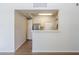 Well-lit kitchen area with stainless steel appliances and modern finishes at 29606 N Tatum Blvd # 265, Cave Creek, AZ 85331