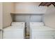 Laundry room with standard side-by-side white washer and dryer at 29606 N Tatum Blvd # 265, Cave Creek, AZ 85331
