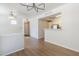 Open-concept living space with modern chandelier and kitchen access at 29606 N Tatum Blvd # 265, Cave Creek, AZ 85331