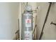 Hot water heater in a utility closet at 29606 N Tatum Blvd # 265, Cave Creek, AZ 85331