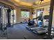 Well-lit gym offering modern cardio equipment for health and fitness enthusiasts at 29606 N Tatum Blvd # 276, Cave Creek, AZ 85331