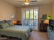 Bright primary bedroom with sliding glass door and relaxing color palette at 29606 N Tatum Blvd # 276, Cave Creek, AZ 85331