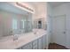Bright primary bath with double sinks, walk in shower, soaking tub, and plenty of light at 2969 E Trigger Way, Gilbert, AZ 85297