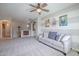 Upstairs bonus room featuring neutral tones, plush carpeting, and soft lighting creates a relaxing retreat at 2969 E Trigger Way, Gilbert, AZ 85297