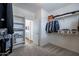 Walk-in closet with custom shelving providing ample storage and organization space at 2969 E Trigger Way, Gilbert, AZ 85297