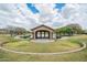 Stone gazebo in the community park surrounded by a walking path and water features at 2969 E Trigger Way, Gilbert, AZ 85297